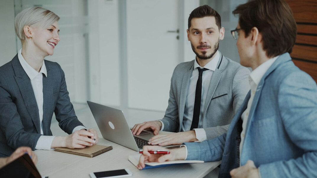 business team discussing contract